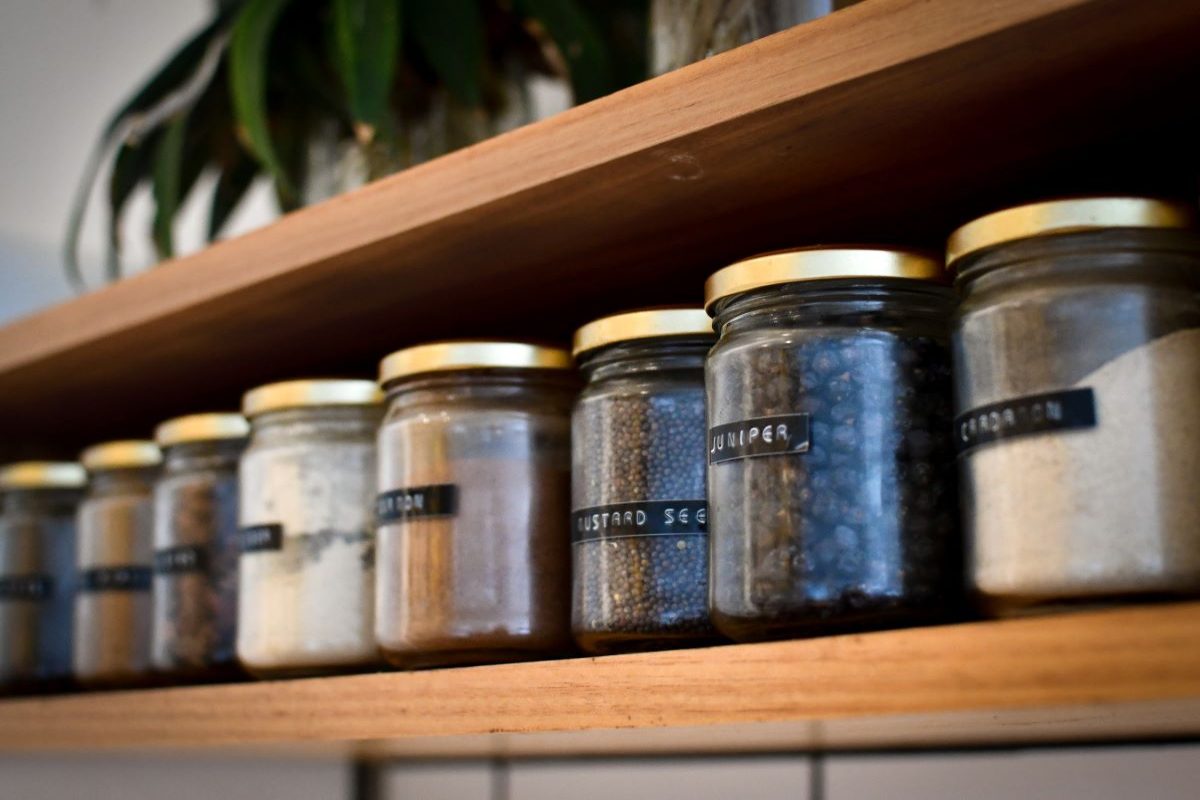 spice up your cabinet shelf by creating labels and adding them to your spices and baking ingredients